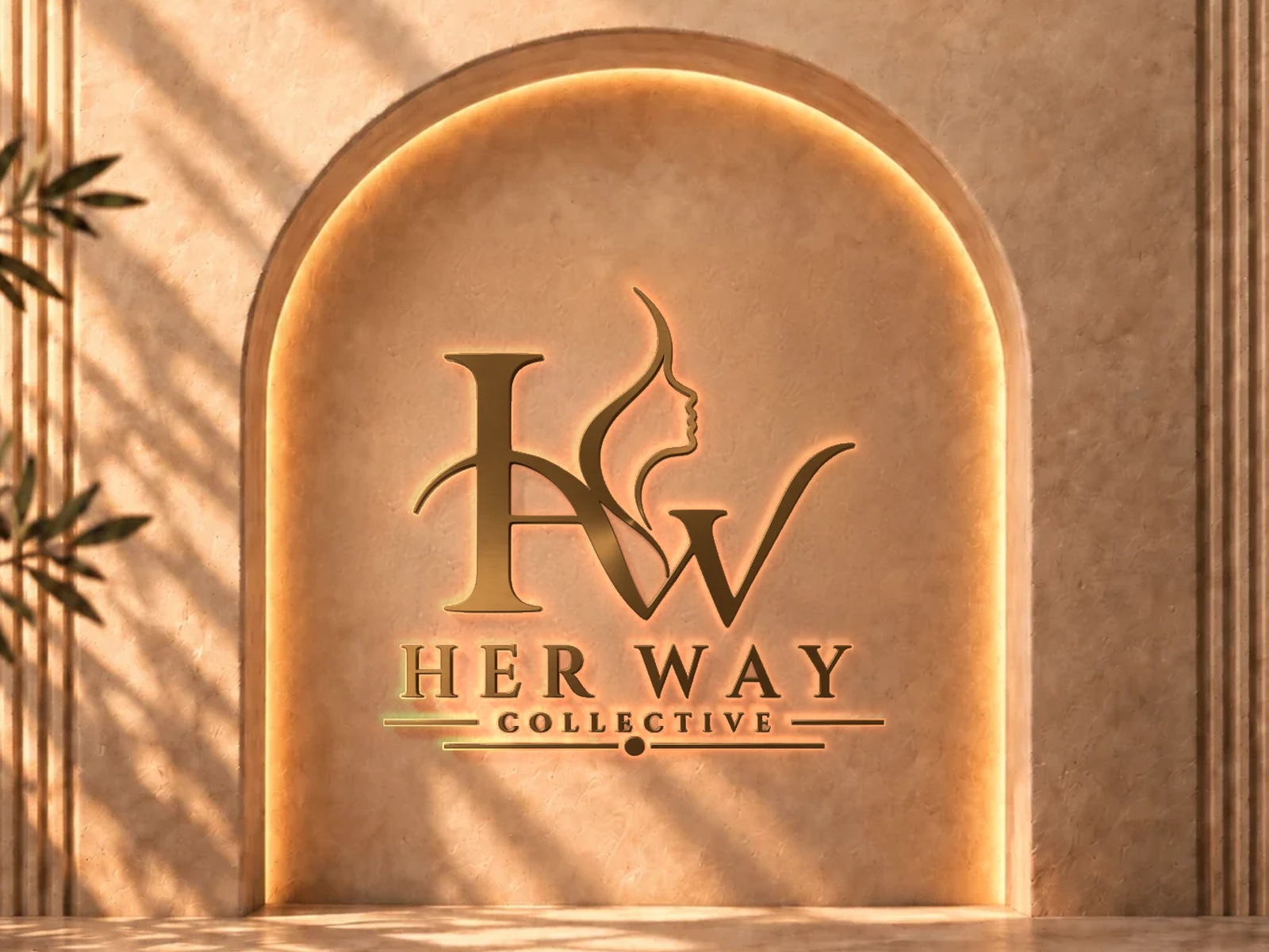 The back-lit Her Way Collective sign centered within a complete plaster arch.